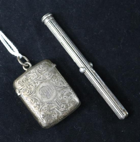 A Victorian silver combination propelling pencil/pen/penknife and a silver vesta case.